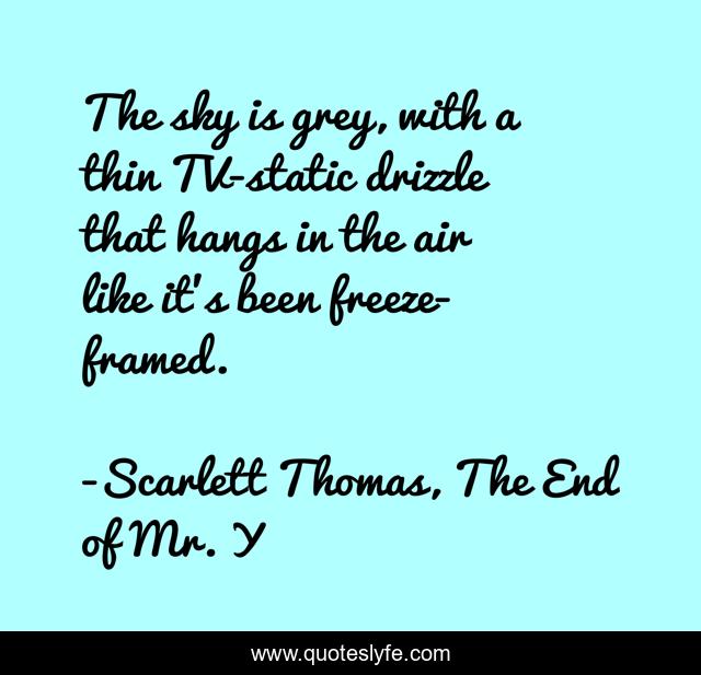 The sky is grey, with a thin TV-static drizzle that hangs in the air like it's been freeze-framed.