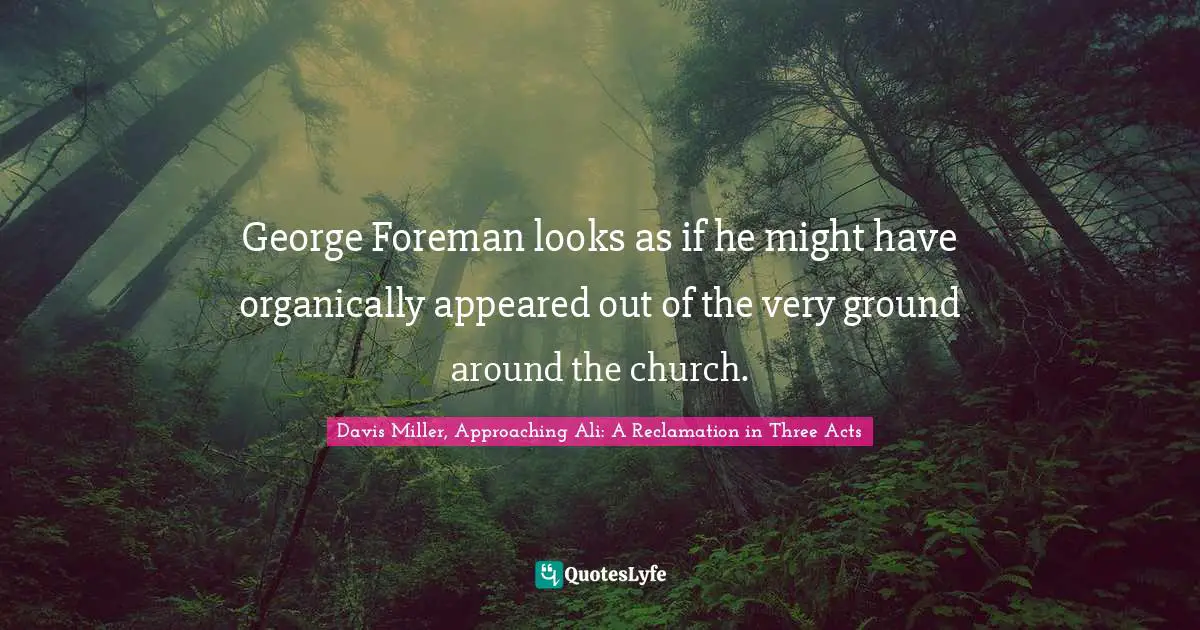 George Foreman looks as if he might have organically appeared out of the very ground around the church.