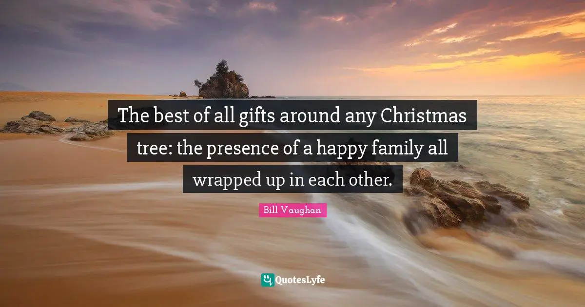 The best of all gifts around any Christmas tree: the presence of a happy family all wrapped up in each other.
